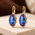 Pendientes colgantes de oro y zafiro