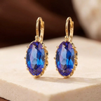 Pendientes colgantes de oro y zafiro
