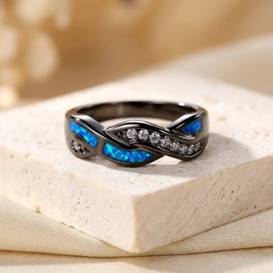 Anillo de plata trenzado con incrustaciones