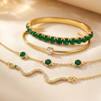 Set de pulseras de oro y esmeralda