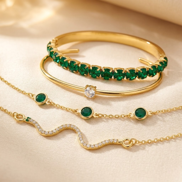 Set de pulseras de oro y esmeralda