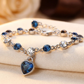 Pulsera de cadena con corazón de zafiro plateada