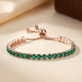 Pulsera tenis ajustable de oro y esmeralda