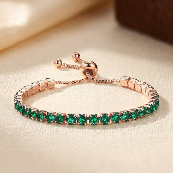 Pulsera tenis ajustable de oro y esmeralda