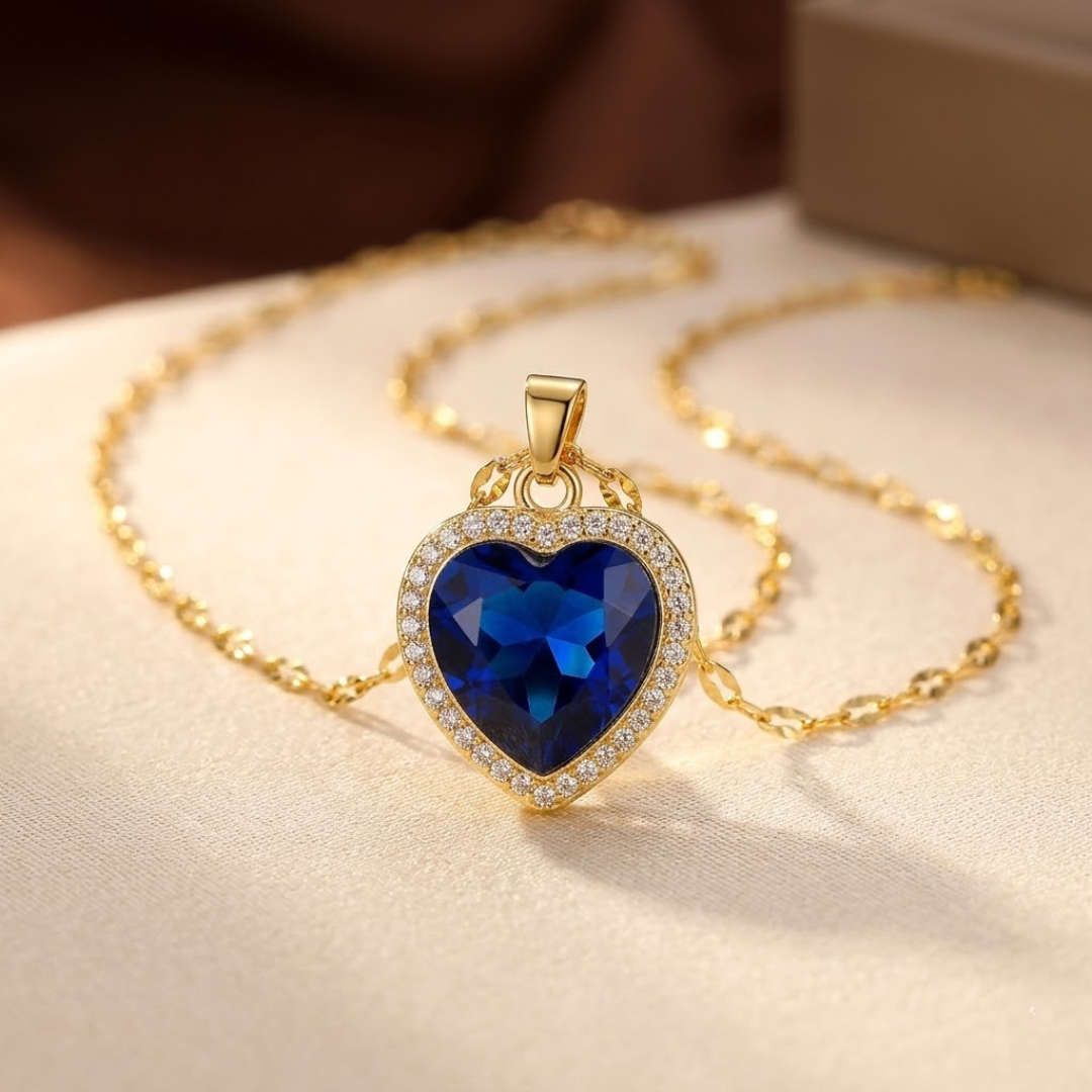 Collar de corazón de zafiro dorado
