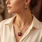 Conjunto de joyas de corazón trenzado de oro y rubí