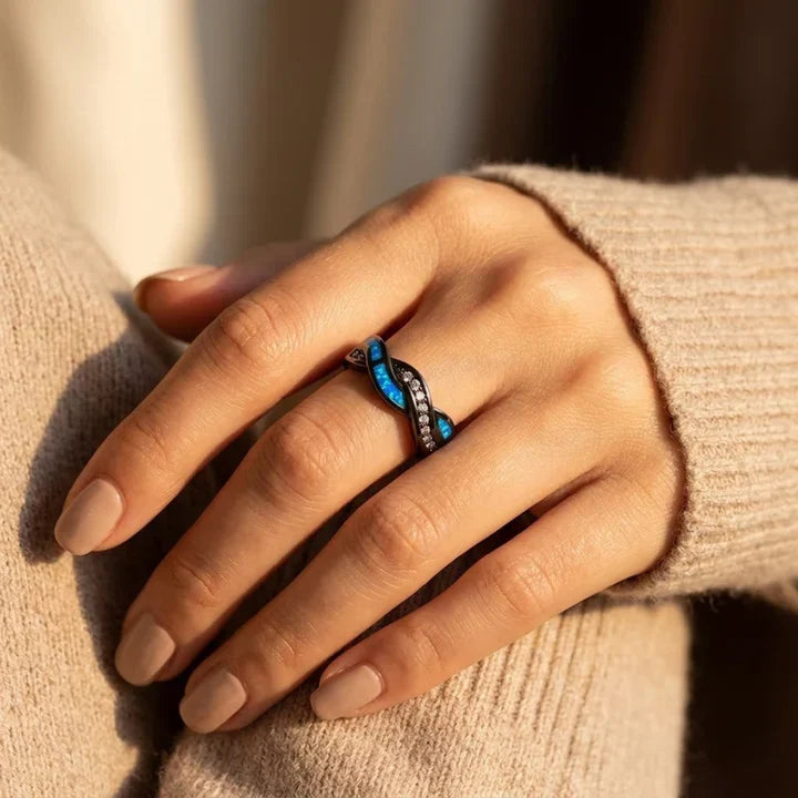 Anillo de plata trenzado con incrustaciones