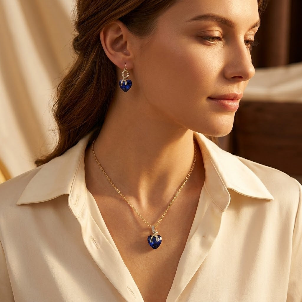 Conjunto de collar y pendientes de corazón de zafiro dorado