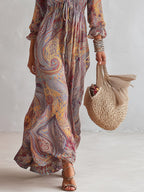Vestido maxi de chiffón con estampado paisley y escote en V