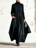 Vestido largo oversize de cuello alto con bolsillos