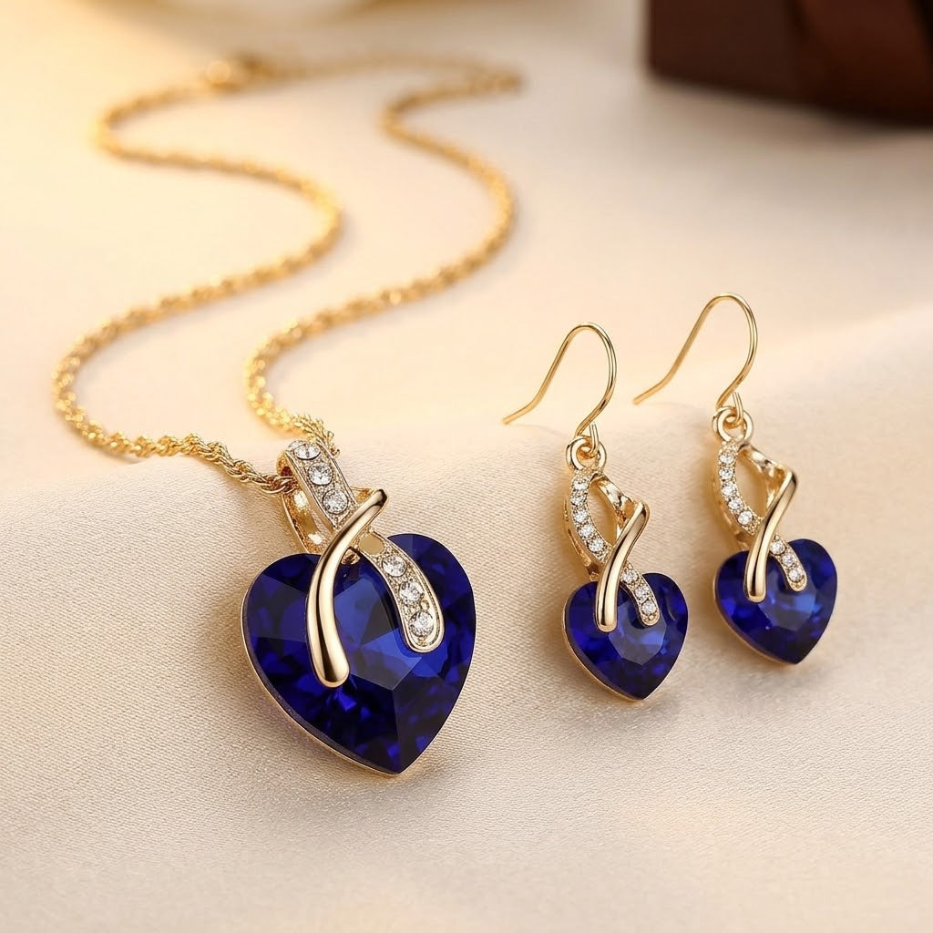 Conjunto de collar y pendientes de corazón de zafiro dorado