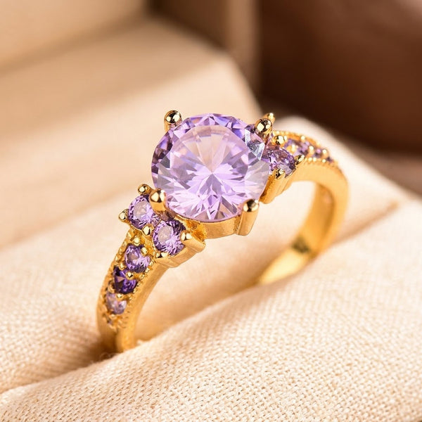 Anillo dorado de amatista