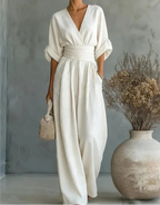 Mono elegante de escote en V y pierna ancha