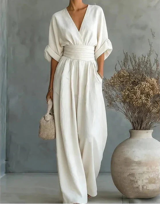 Mono elegante de escote en V y pierna ancha
