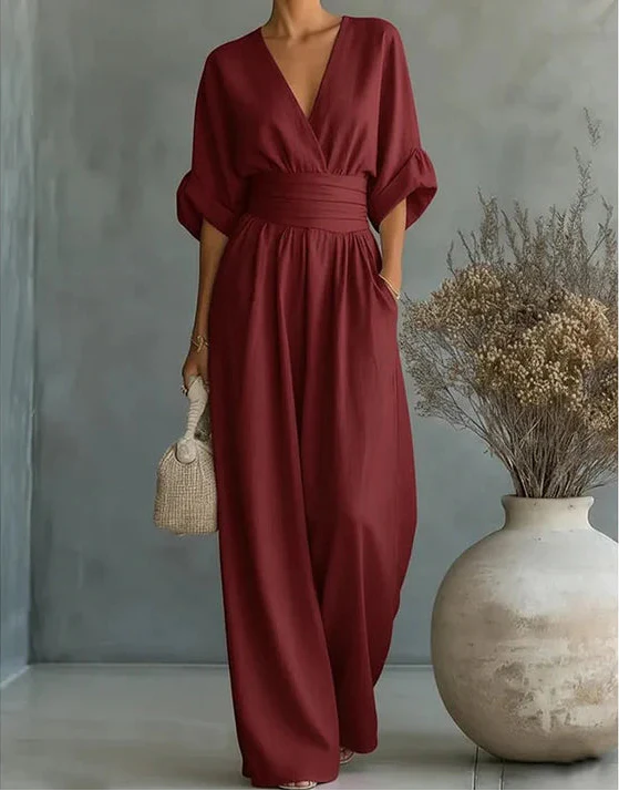 Mono elegante de escote en V y pierna ancha